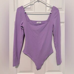 Babaton Lavender Long Sleeve Bodysuit from Aritzia